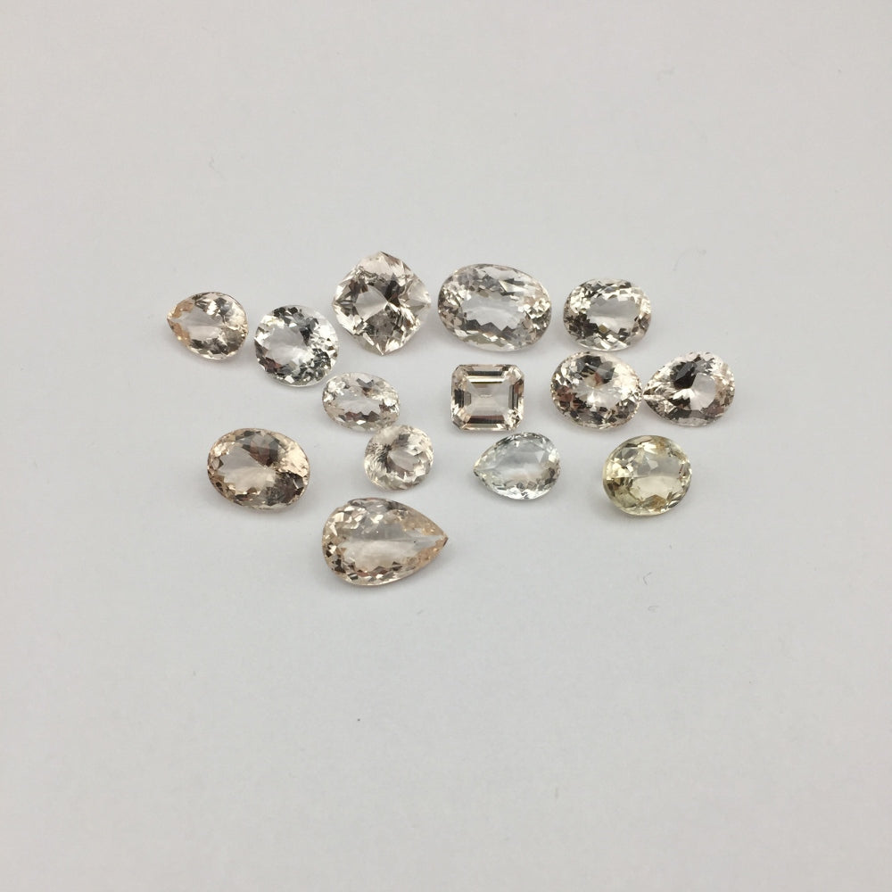 Natural Champagne Topaz Lot — 14 Pieces, 57.30 ct Total, Pakistan (GL)