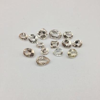 Natural Champagne Topaz Lot — 14 Pieces, 57.30 ct Total, Pakistan (GL)