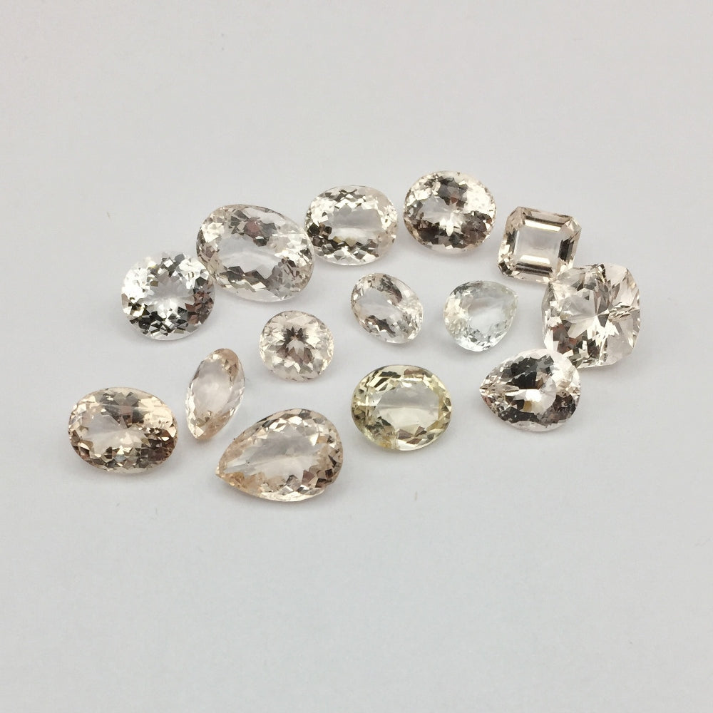 Natural Champagne Topaz Lot — 14 Pieces, 57.30 ct Total, Pakistan (GL)