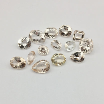 Natural Champagne Topaz Lot — 14 Pieces, 57.30 ct Total, Pakistan (GL)