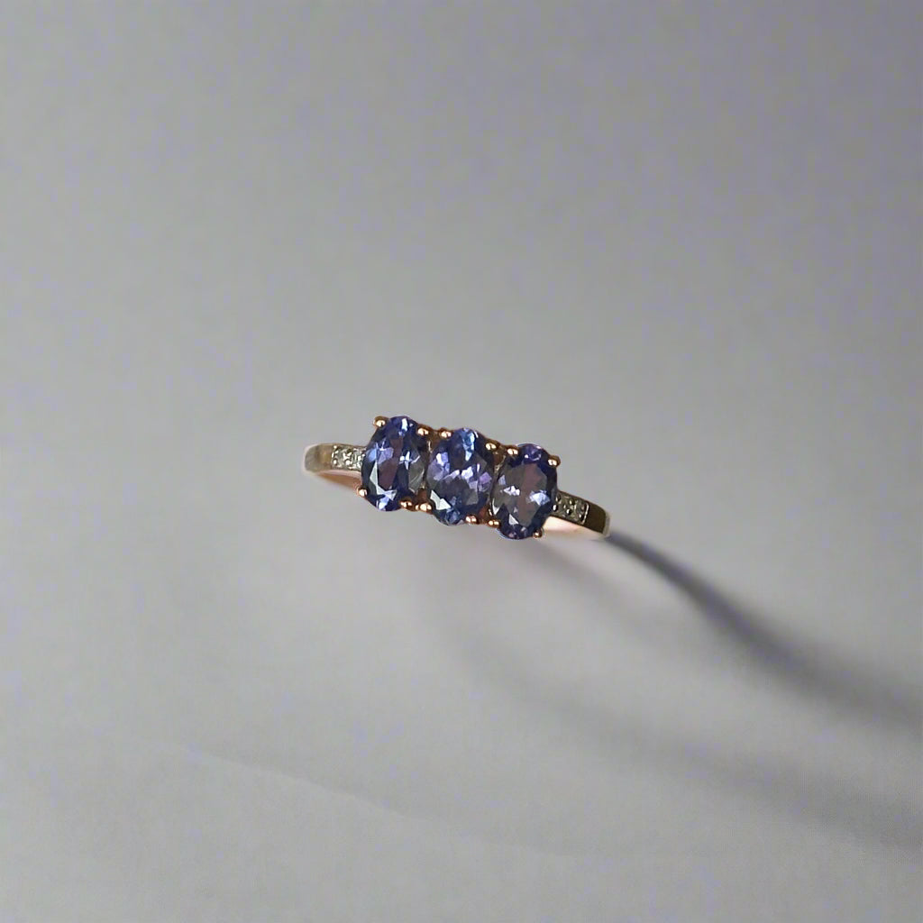 Elegant 10K Yellow Gold Tanzanite & Diamond Ring
