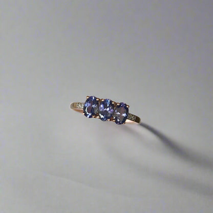 Elegant 10K Yellow Gold Tanzanite & Diamond Ring